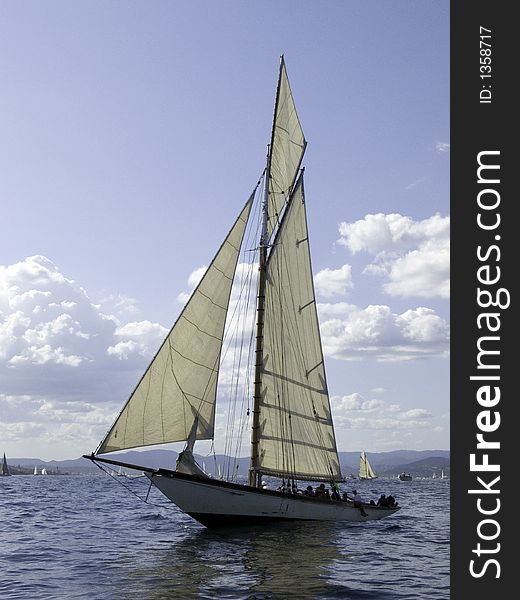 Traditional sailing yacht in a light breeze. Traditional sailing yacht in a light breeze