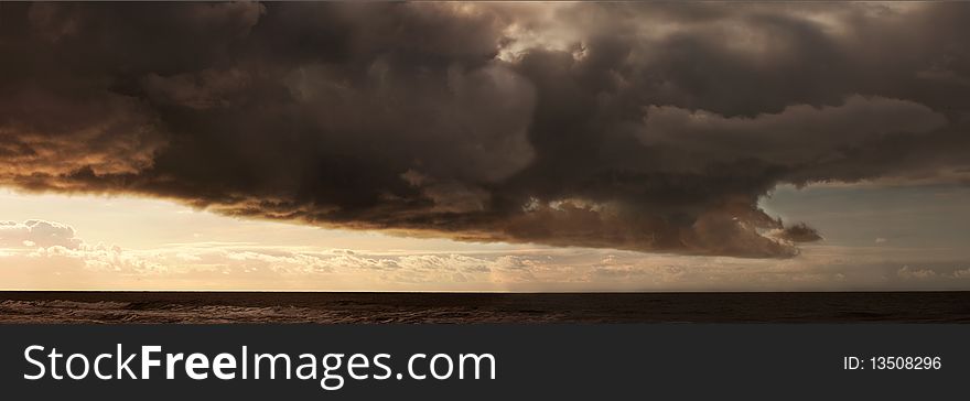 Evening clouds over Zandvoort at sea, Netherlands. Evening clouds over Zandvoort at sea, Netherlands