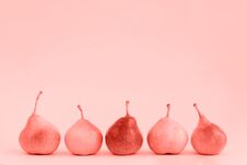 Group Of Pears On Living Coral Background Stock Image