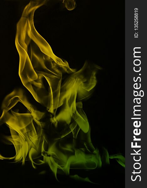 Abstract beautiful colorful smoke on black background, fire design. Abstract beautiful colorful smoke on black background, fire design