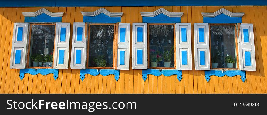 Part of rural house. Four windows.