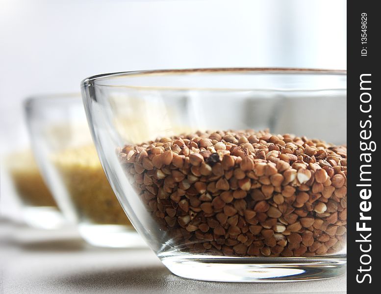 Three grains in glass bowls