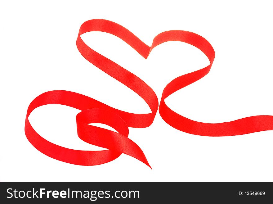 Red ribbon in heart shape isolated on white background