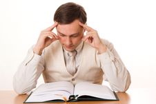 Young Handsome Businessman Reading A Book On White Stock Image Young Handsome Businessman Reading A Book On White Stock Image