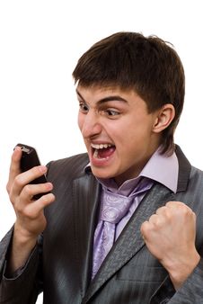 Angry Young Businessman Talking On The Phone Stock Photography