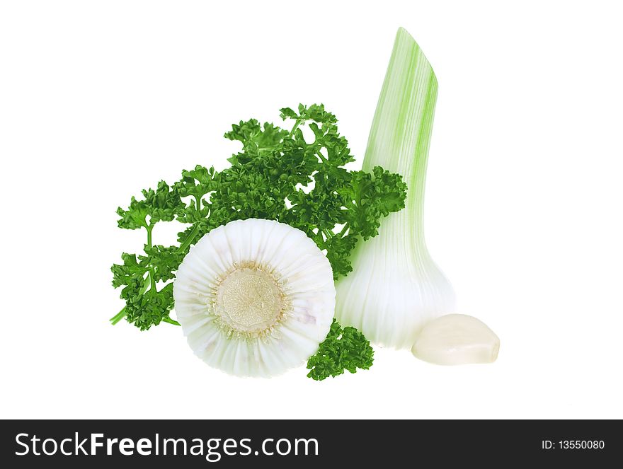 Fresh garlic and parsley isolated on white background