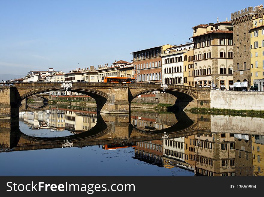 Buildings and bridge by the Arno river in Florence, Tuscany, Italy