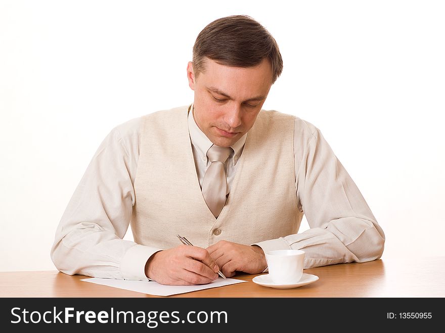 Handsome businessman, wrote a table on a white background. Handsome businessman, wrote a table on a white background