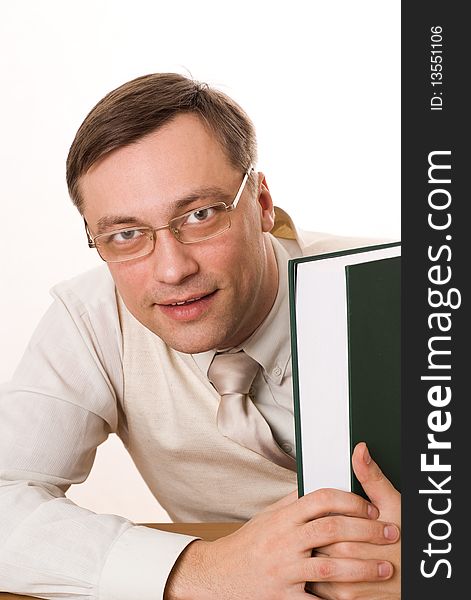 Young handsome businessman with a book on white background