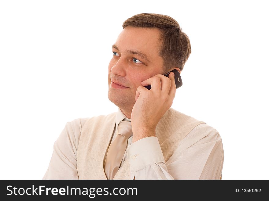 Young man talking on the phone on a white