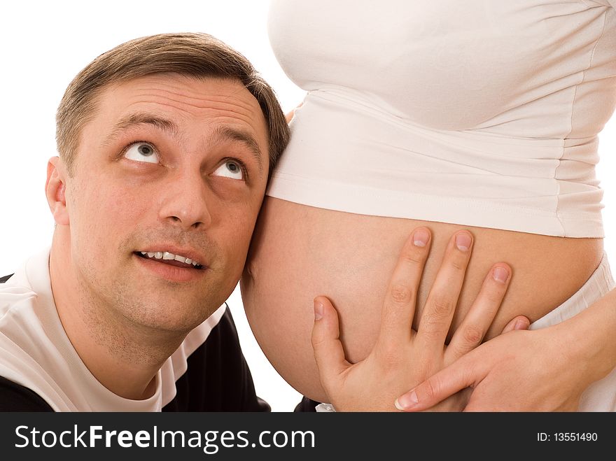 Man with his pregnant wife together on a white background. Man with his pregnant wife together on a white background