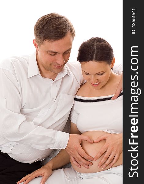 Happy man with his wife were sitting on a white background