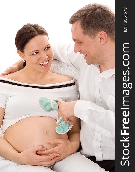 Man with his pregnant wife sitting