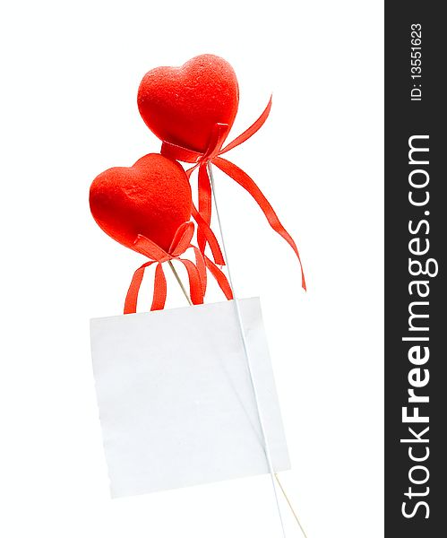 Two Hearts and note isolated on white