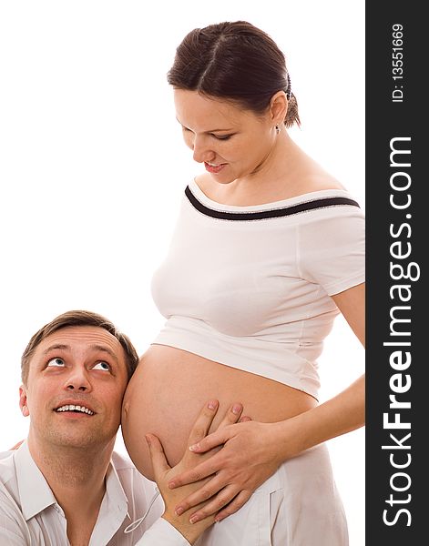 Man with his pregnant wife together on a white background. Man with his pregnant wife together on a white background