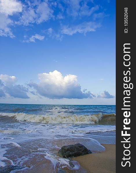 Wave surging on sand on beach and beautiful cloud. Wave surging on sand on beach and beautiful cloud