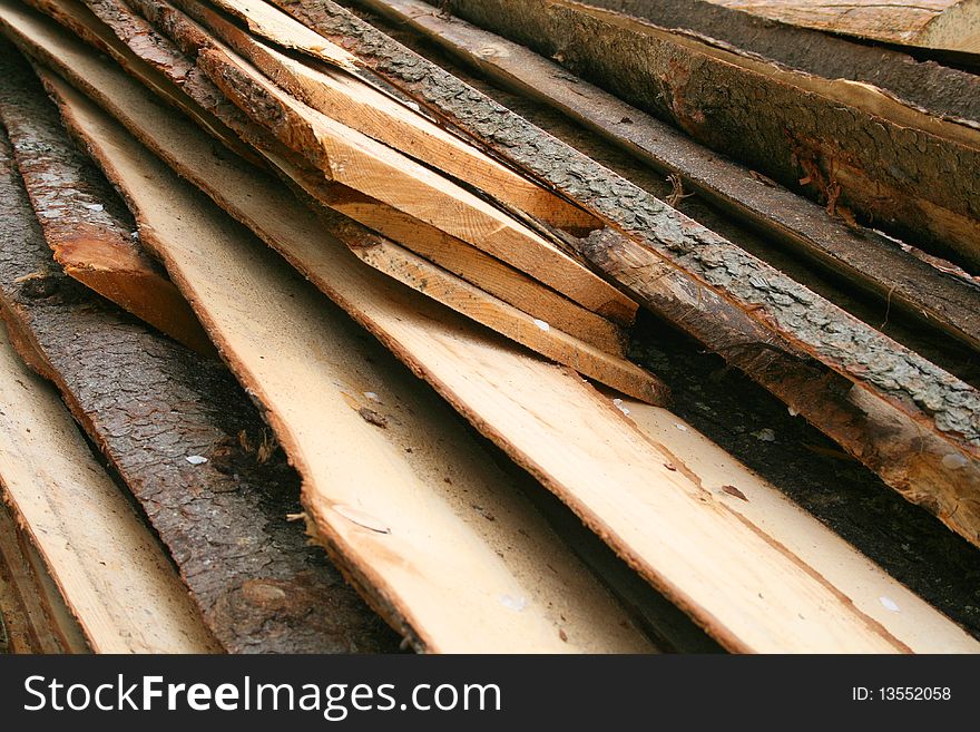 A pile of boards, logging. A pile of boards, logging