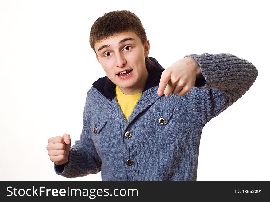 Beautiful teenager is angry at white background