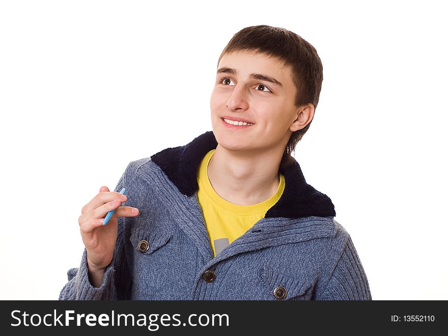 Beautiful teenager in a blue jacket standing on a white