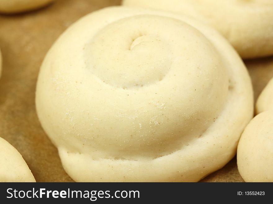 Raw yeast dough for buns. Growing stage. Raw yeast dough for buns. Growing stage