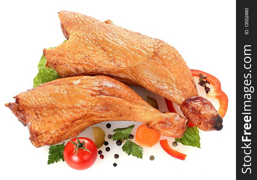 Chicken legs white background and vegetables