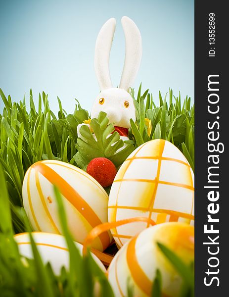 Easter eggs and bunny in grass