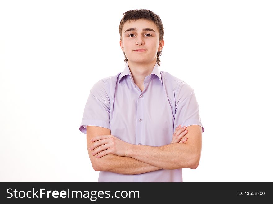 Cute teenager in a purple shirt standing. Cute teenager in a purple shirt standing