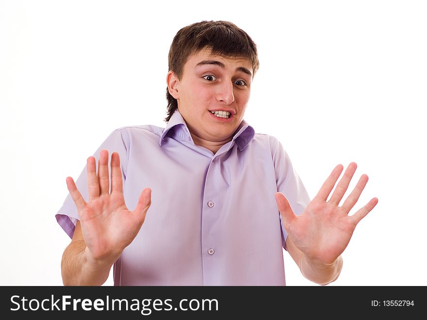 Teenager Standing Against A White Background