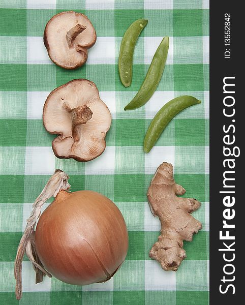 Group of Vegetables on a Green Checkered Cloth