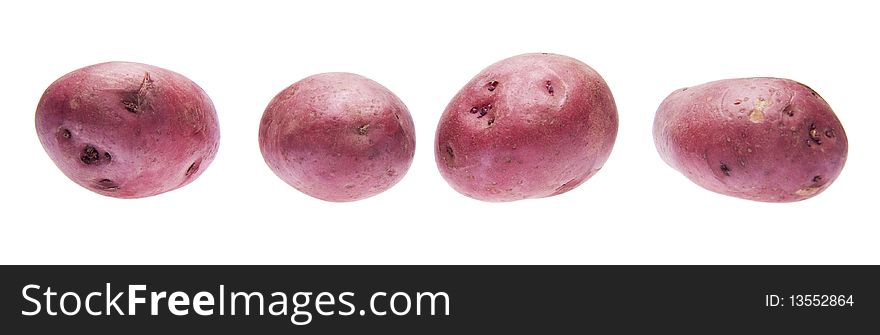 Four Red Potatoes isolated on white with a clipping path.