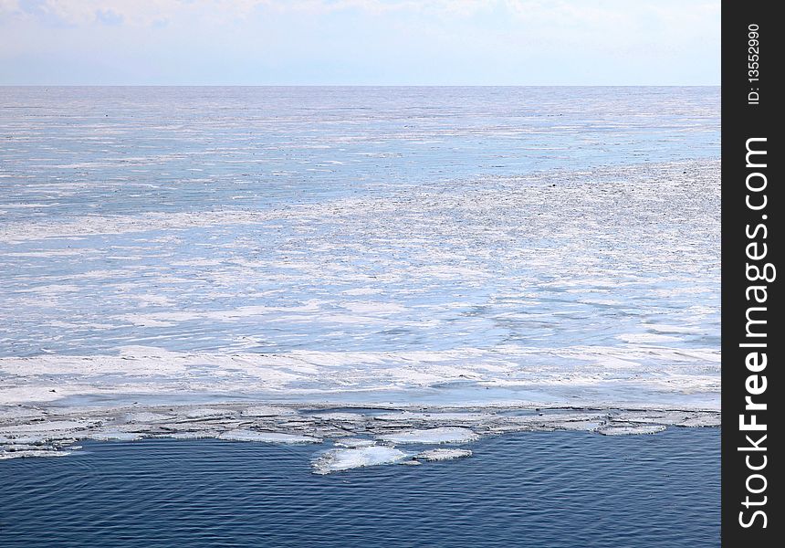 Frozen Lake Baikal. Spring. Day.