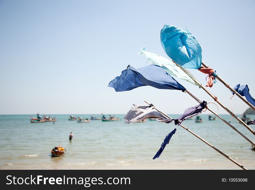 Blue Flags On The Sea Background