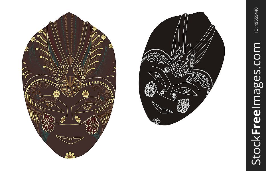 Two traditional masks, one with simple lines and the other with painted sculptured lines.