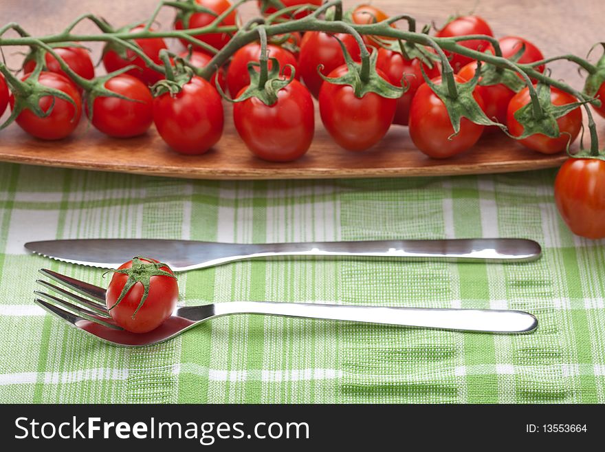 Tomatoes fork and knife