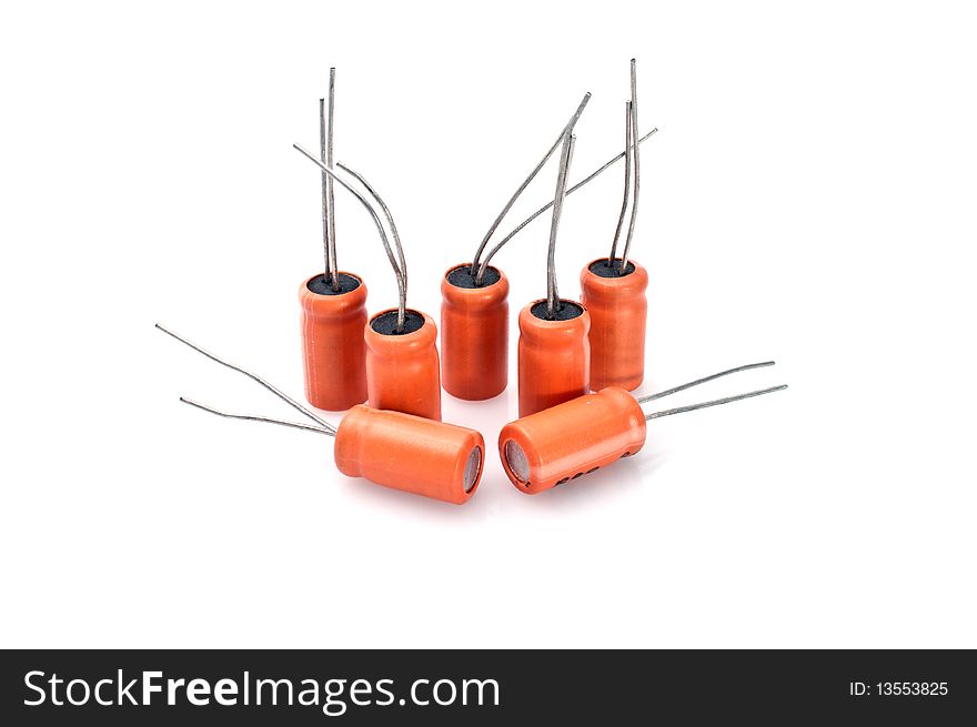 Electronic capacitors against on a white background