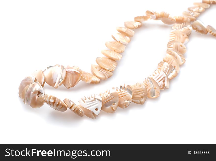 Necklace is made of sea shell in the form of fish