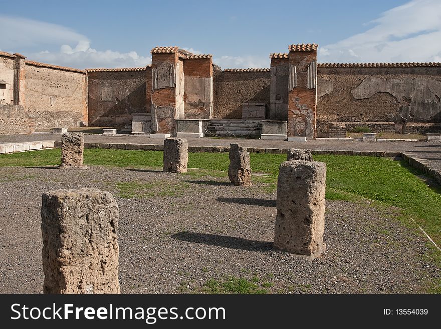 A photo of a portion of the ruins at the ancient city of Pompeii. The city was destroyed by the eruption of the volcano, Mount Vesuvius in 79 AD. A photo of a portion of the ruins at the ancient city of Pompeii. The city was destroyed by the eruption of the volcano, Mount Vesuvius in 79 AD