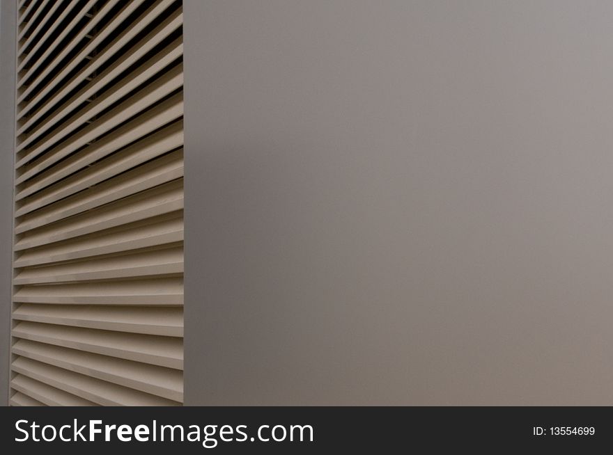 Detail of a modern  building with beige blinds can be used as a background