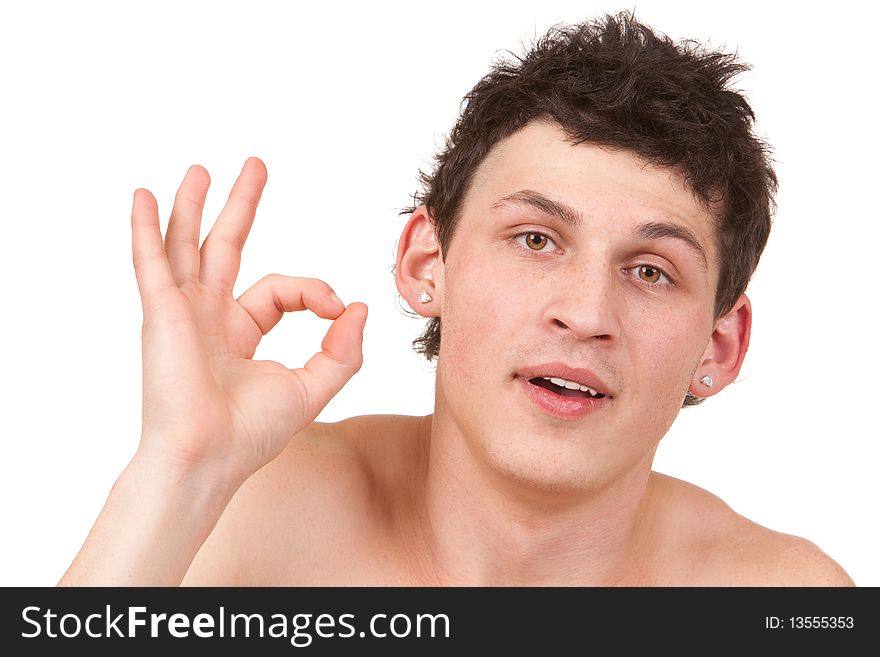 Handsome young man showing ok gesture isolated portrait