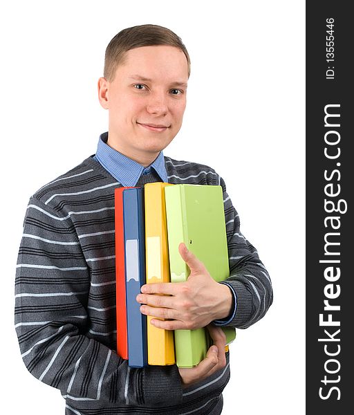 Man with heap of folders looking at camera