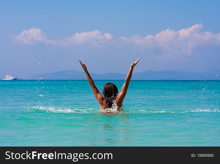 Girl with long hair playing in the sea. Girl with long hair playing in the sea