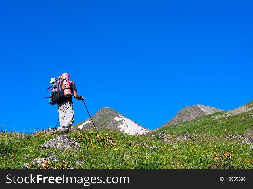 Happy hiker in Caucasus mountains