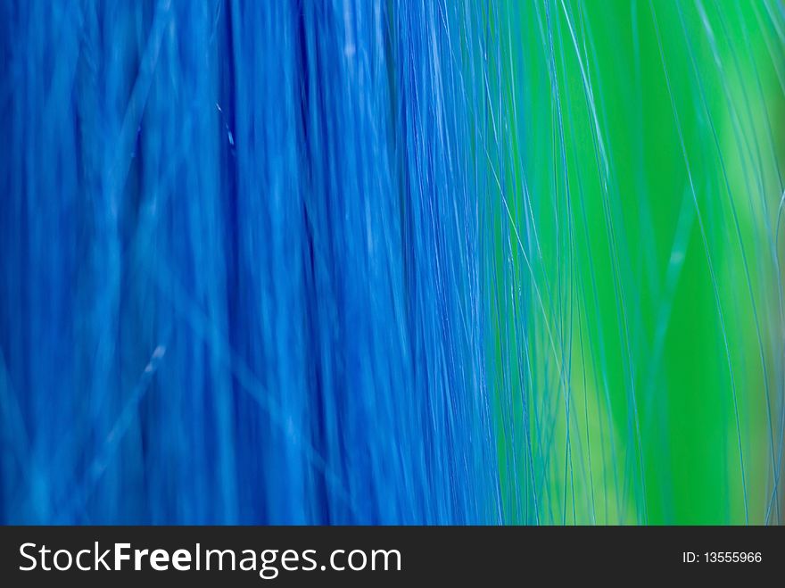 Background of artificial hair blue and green color. Background of artificial hair blue and green color.