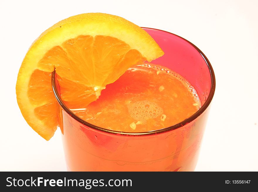 Close up of a glass with orange juice