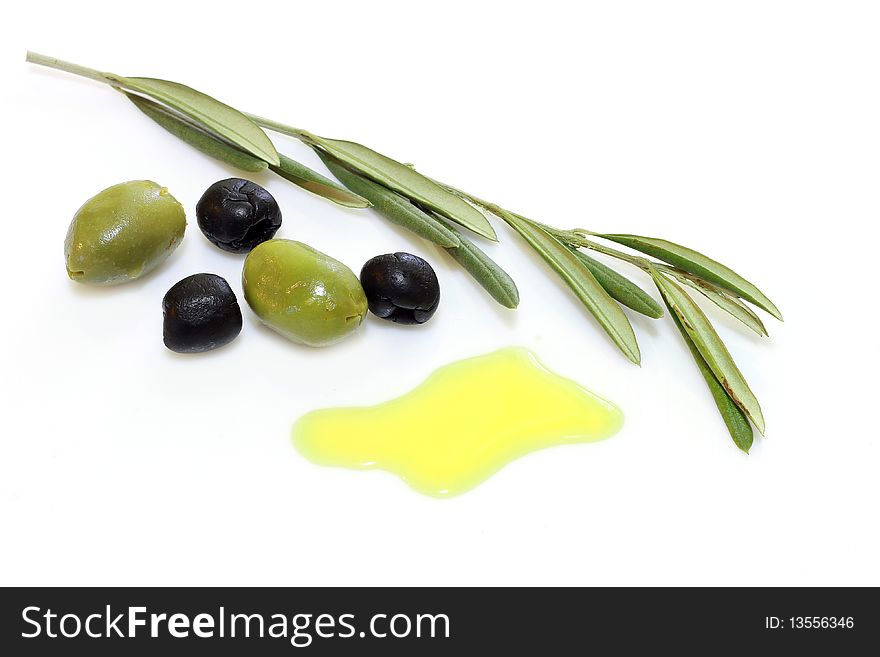 Olives with leaves on a white background