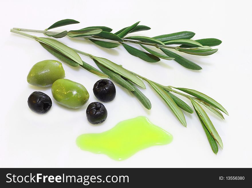 Olives with leaves on a white background