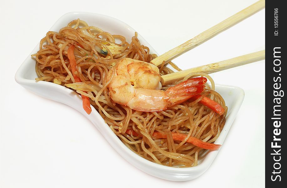 Soy spaghetti with shrimp and chopsticks