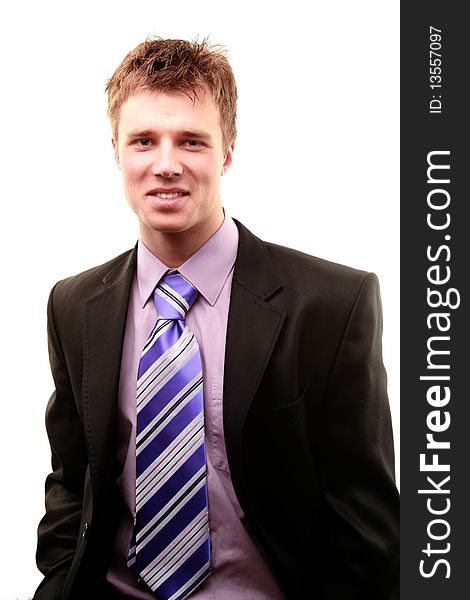 Smiling young businessman isolated on a white background