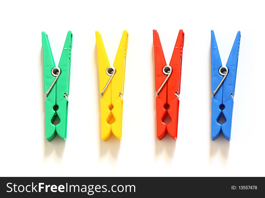 Olor clothes-peg isolated on white background