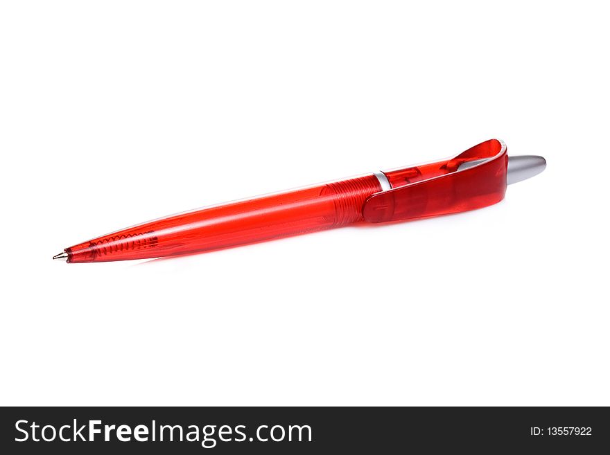 Isolated red pen at white